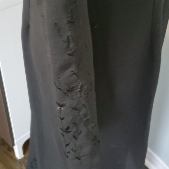 Full length black lightweight overcoat. - Picture 4 of 7